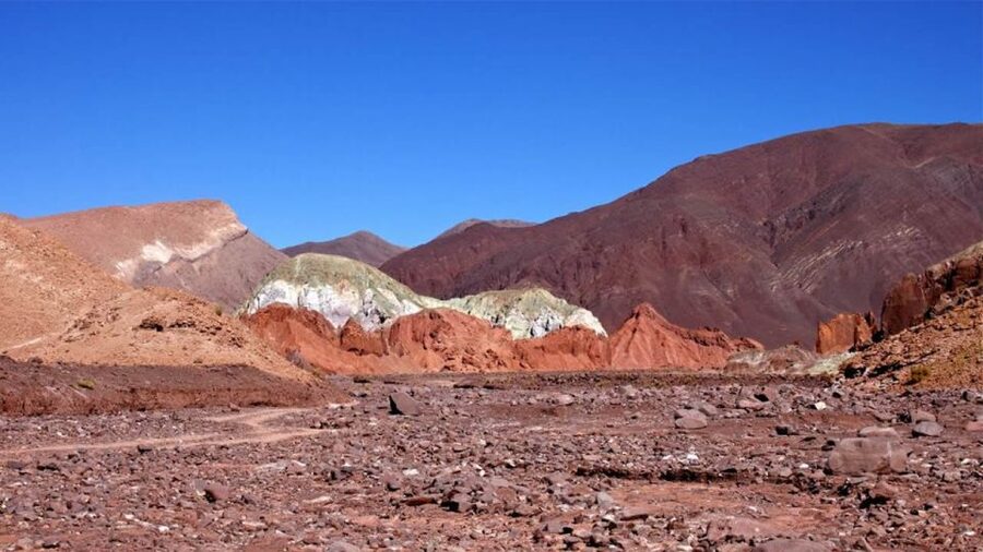 From San Pedro de Atacama: Rainbow Valley Tour - Rainbow Valley, where clay paints the hills