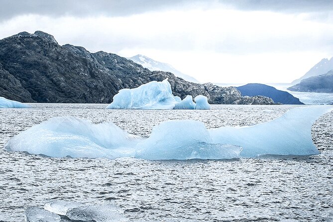 Grey Glacier Boat Tour with Pick Up from Puerto Natales - Walking Grey Beach before boarding the GREY III