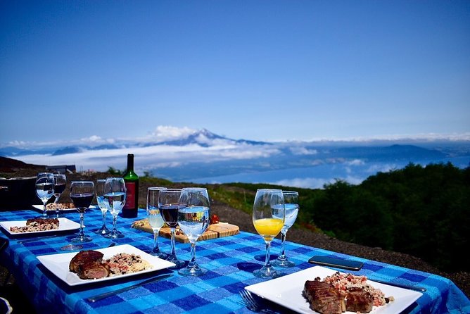 Premium Full Day Shared Tour Osorno Volcano and Petrohue Falls - Riding upward on Osorno Volcano