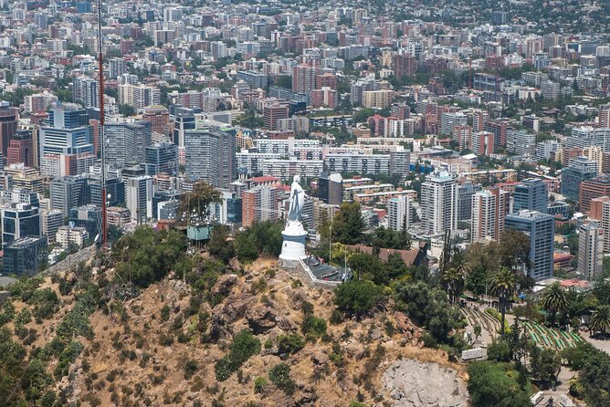 Private Helicopter Tour above Santiago with hotel transport - Downtown, the government palace, and the main square