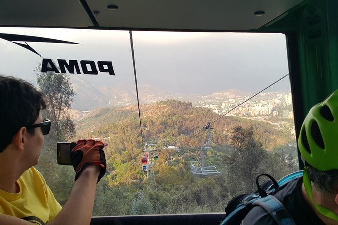 Private San Cristobal Hill Mountain Bike Tour - Leaving the hill for Vitacura and Bicentennial Park