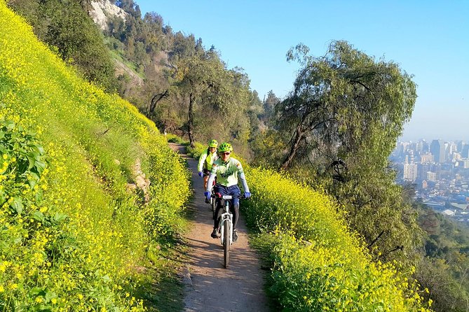 Private San Cristobal Hill Mountain Bike Tour - Taking the cable car toward San Cristóbal Hill