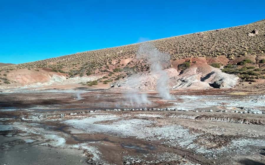 San Pedro de Atacama: El Tatio Geyser Field and Wetlands - El Tatio at sunrise, steam and silence