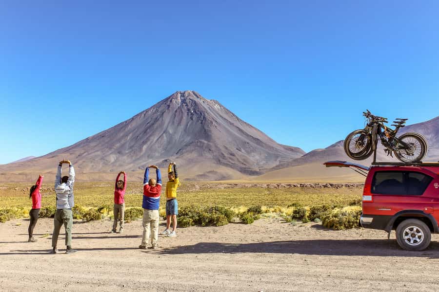 San Pedro de Atacama: Volcano Downhill Bike Tour - Morning pickup and the drive into the Andes