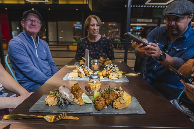 Santiago Food Tour: Bohemian Flavors and Local Gems - Stop two at Av. Italia 1568: smoked ribs and fried fish