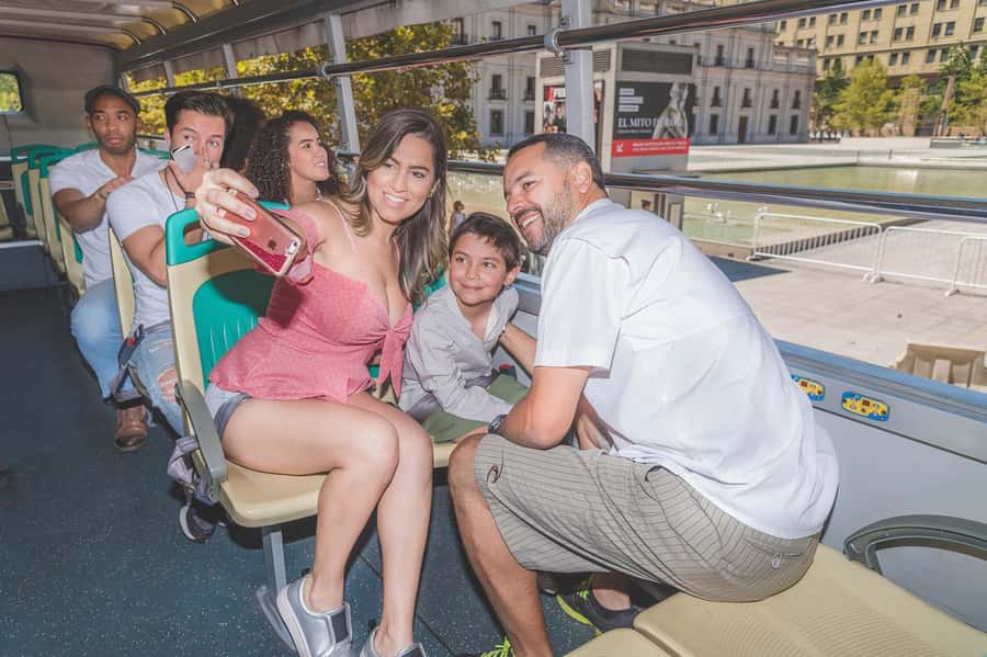 Santiago: Hop-on Hop-off Bus Day Ticket with Audio Guide - Aviation Plaza follows the Mapocho River