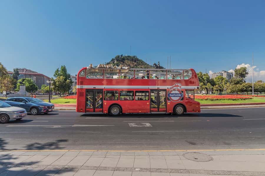 Santiago: Hop-on Hop-off Bus Day Ticket with Audio Guide - Reach Cerro San Cristóbal by cable car