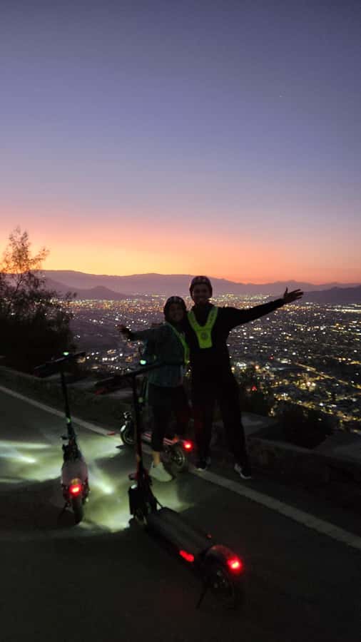 Santiago sunset tour on an electric scooter. City and nature - Starting at San Cristóbal with a Scooter