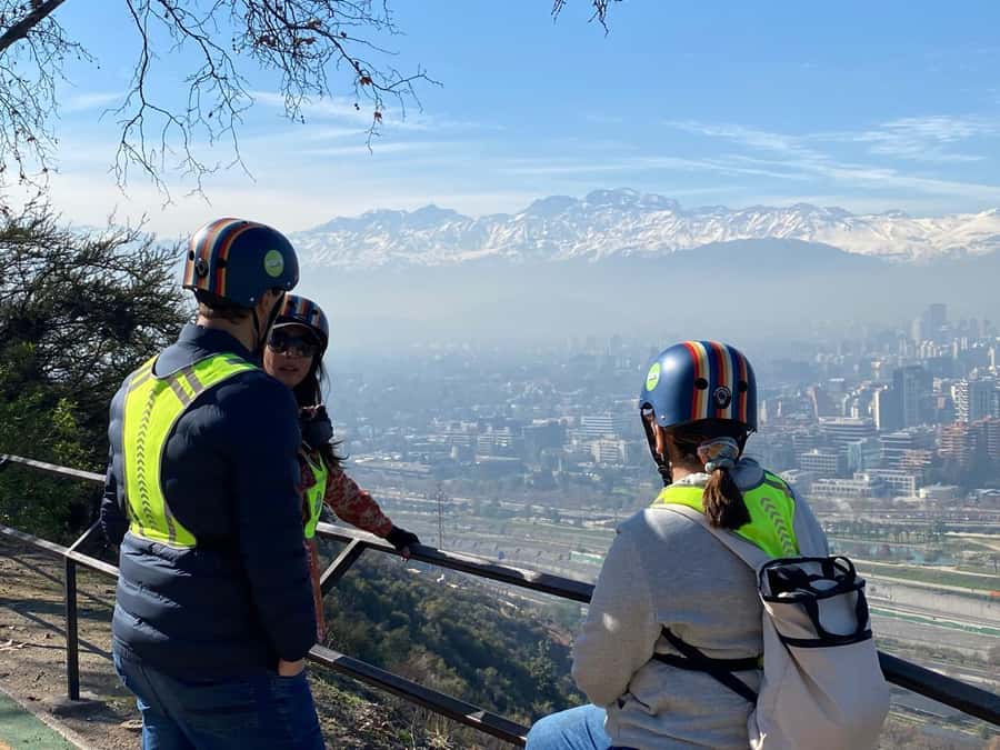 Santiago sunset tour on an electric scooter. City and nature - Churches, Plazas, and Providencia’s Local Character