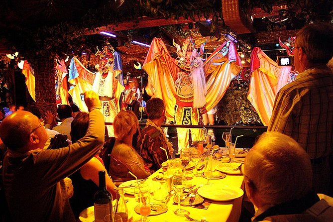 Traditional Chilean Show with Dinner and Private Transportation in Santiago - Inside the Moai-inspired setting