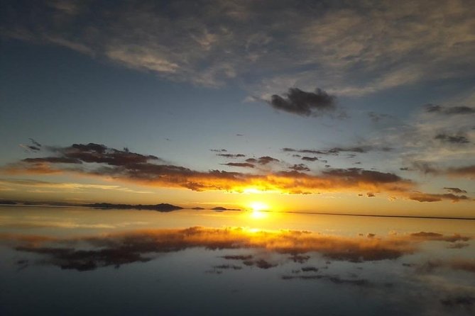 Uyuni Saltflat from San Pedro de Atacama ROUNDTRIP or ONE WAY to Uyuni - Colchani, the Train Cemetery, and your choice of finish