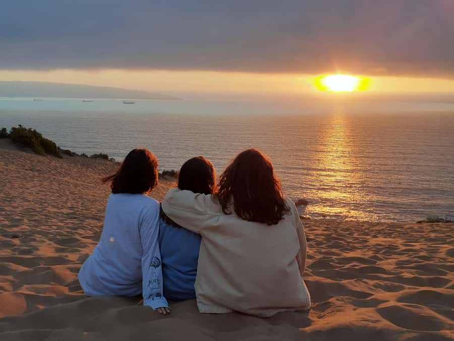 Valparaíso: Sandboarding and Sunset in Concon Sand Dunes - Golden hour over the Pacific Ocean